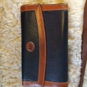 VGUC. Vintage leather Dooney & Bourke wallet with checkbook cover.
